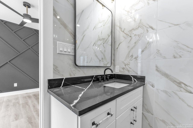 bathroom featuring wood-type flooring and vanity