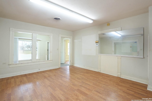 empty room with light wood-type flooring