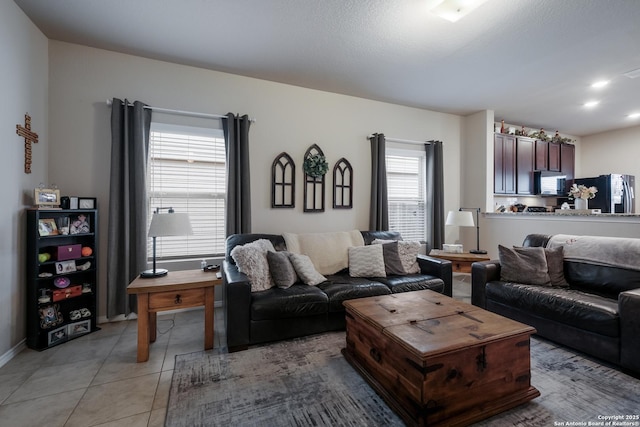 living room with light tile patterned floors