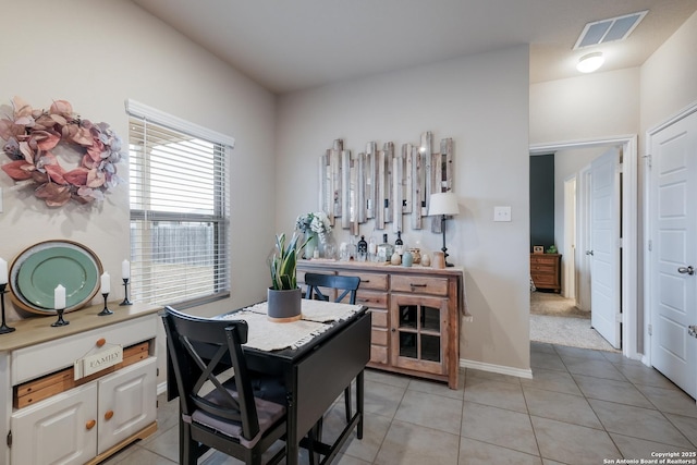 dining room with light tile patterned floors