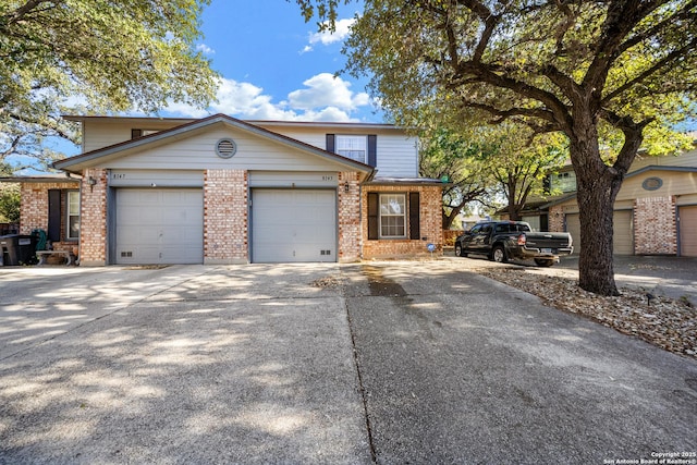 front of property with a garage