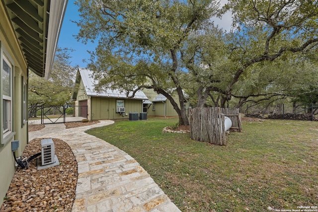 view of yard featuring central AC