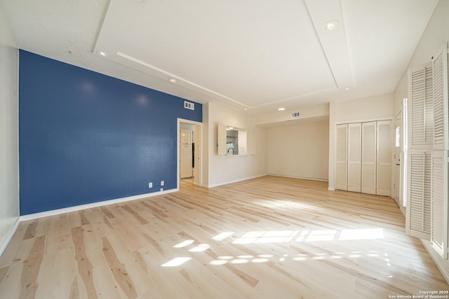 unfurnished bedroom featuring light hardwood / wood-style flooring