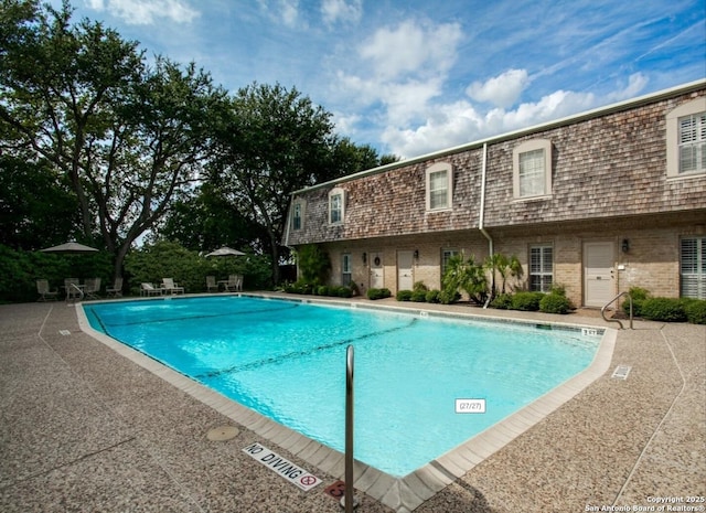 7731 Broadway Unit A8, San Antonio, TX 78209 - pool with a patio