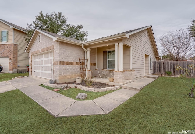 ranch-style home with a garage and a front lawn