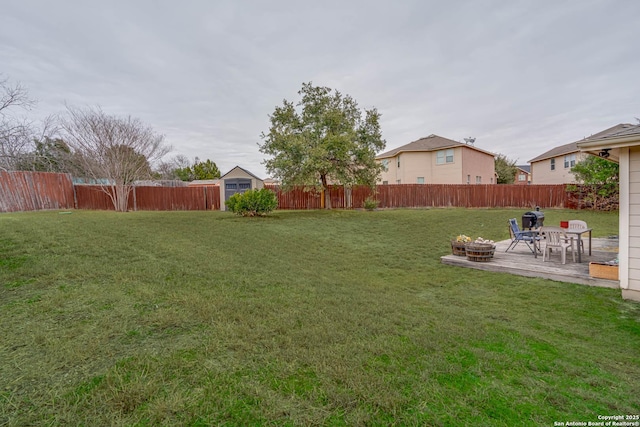 view of yard featuring a fire pit and a patio area