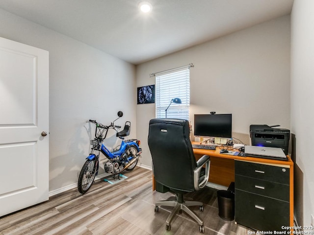 home office featuring hardwood / wood-style flooring