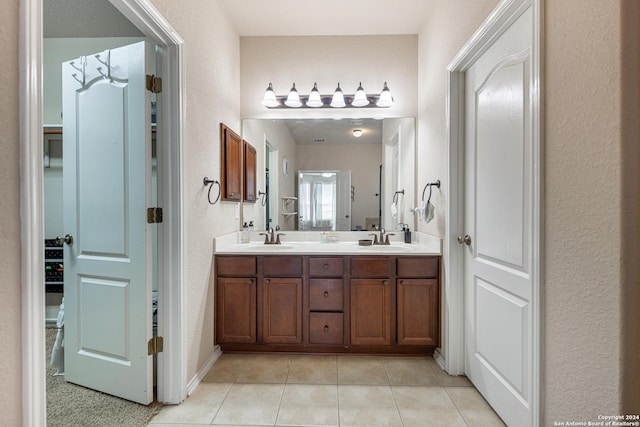 bathroom with vanity and tile patterned floors