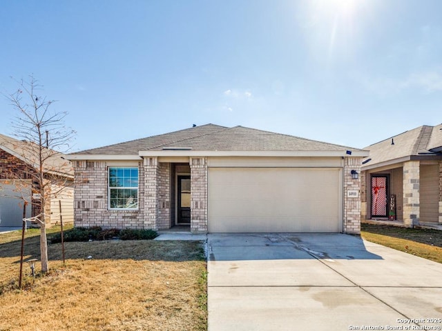 ranch-style house featuring a garage