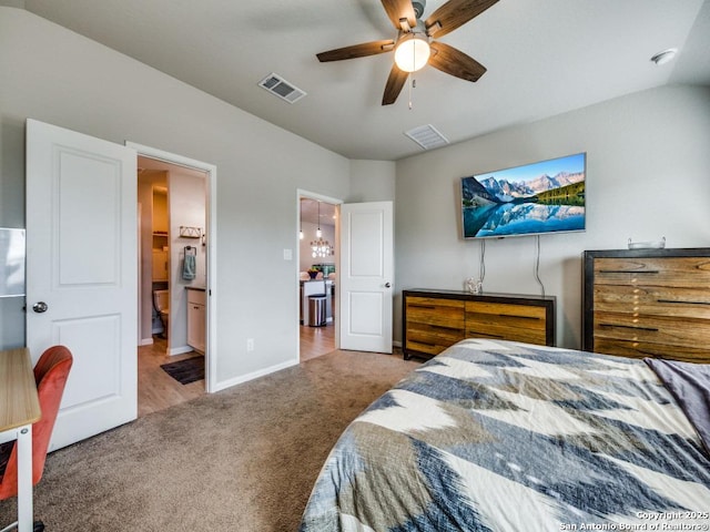 carpeted bedroom featuring connected bathroom and ceiling fan