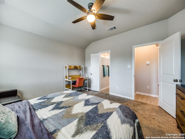 bedroom featuring lofted ceiling, carpet, and ceiling fan