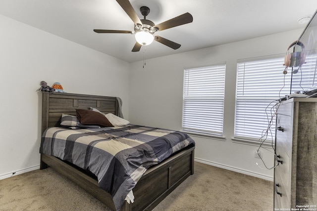 bedroom featuring ceiling fan and carpet flooring