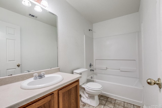 full bathroom featuring vanity, toilet, and bathing tub / shower combination