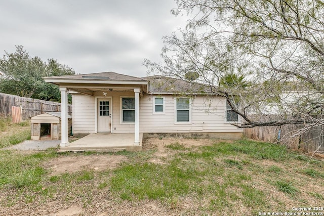 back of property with a patio area