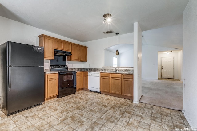 kitchen featuring sink, black appliances, light carpet, and vaulted ceiling