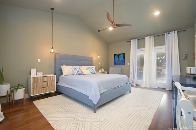 bedroom featuring ceiling fan, wood-type flooring, and lofted ceiling