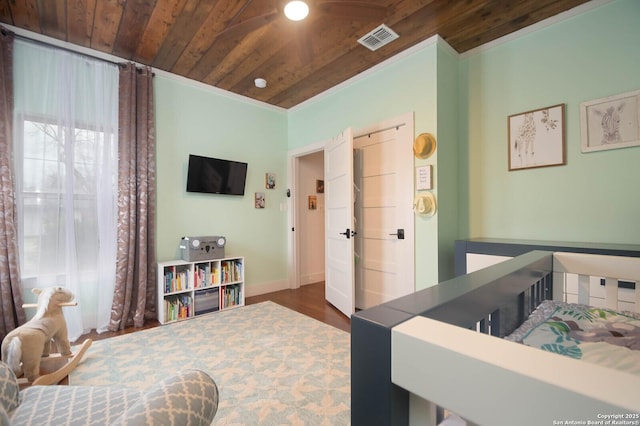 bedroom featuring wooden ceiling and dark hardwood / wood-style flooring