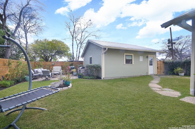 exterior space featuring a patio and a yard