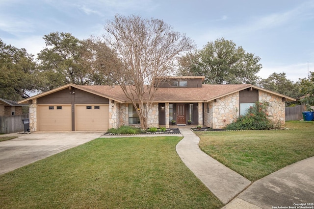 ranch-style house featuring a garage and a front yard