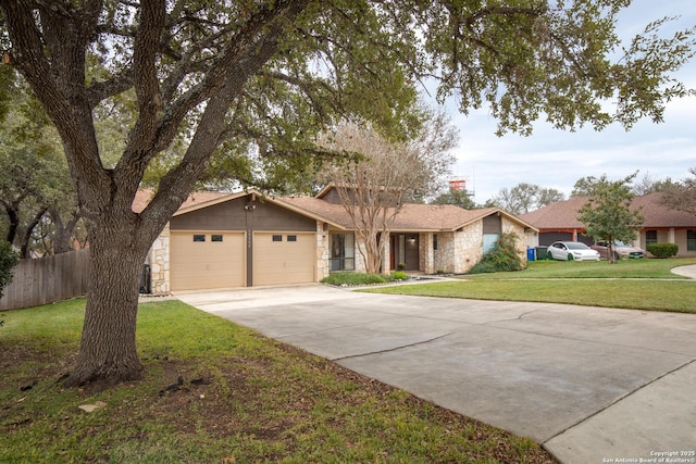 ranch-style house with a front yard and a garage