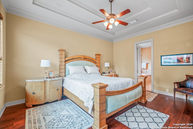 bedroom featuring ceiling fan, a raised ceiling, and crown molding