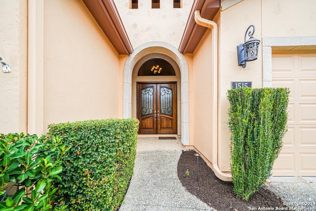 entrance to property featuring a garage