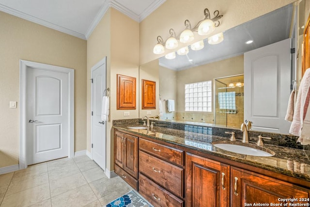 bathroom featuring vanity, tile patterned floors, crown molding, and an enclosed shower