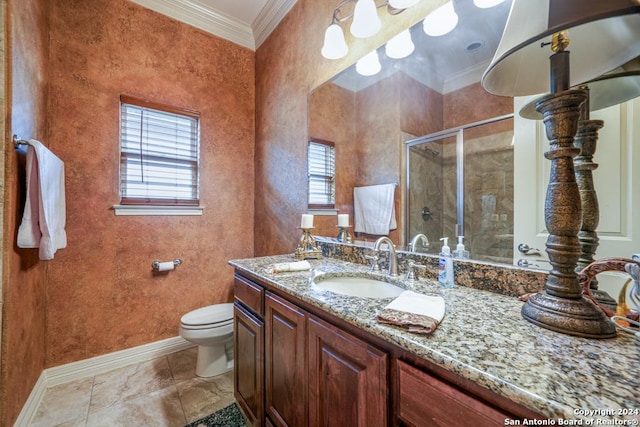 bathroom featuring tile patterned floors, ornamental molding, toilet, walk in shower, and vanity