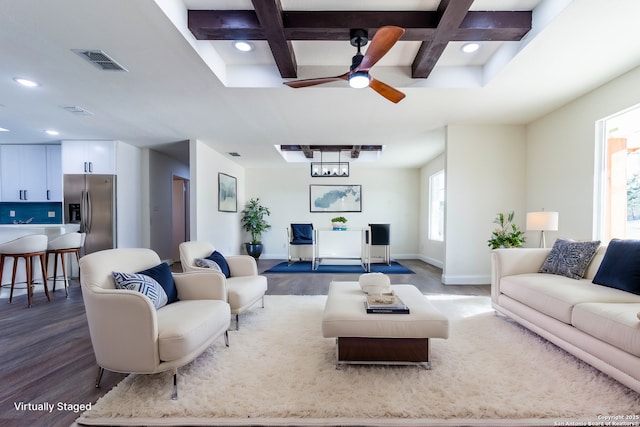 living room with coffered ceiling, beamed ceiling, ceiling fan with notable chandelier, and dark hardwood / wood-style floors