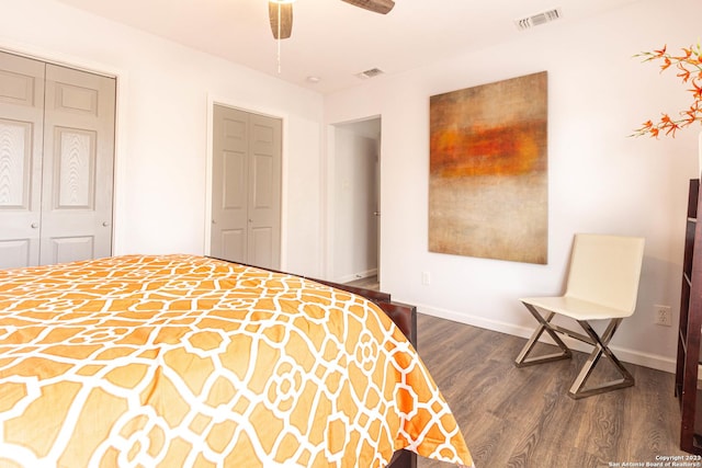 bedroom with ceiling fan and dark hardwood / wood-style flooring