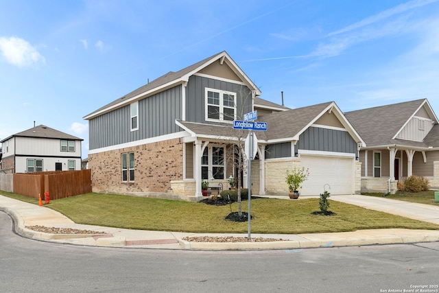 view of front of home featuring a garage and a front lawn