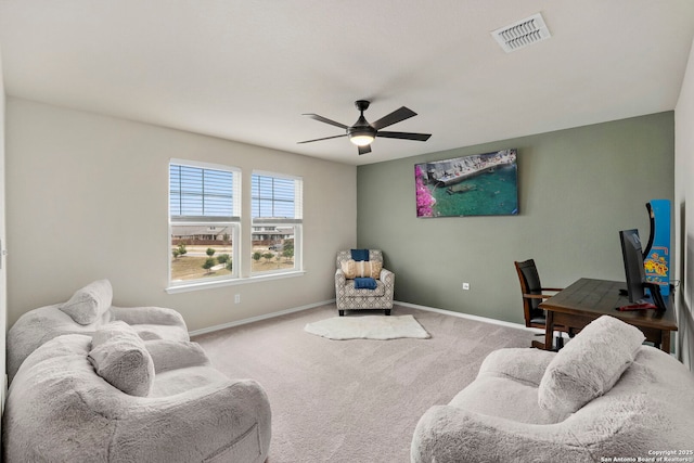 interior space with carpet floors and ceiling fan