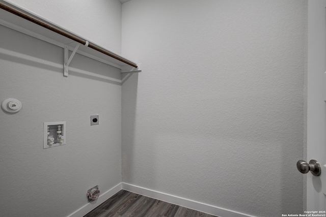 laundry area featuring laundry area, baseboards, dark wood finished floors, hookup for an electric dryer, and washer hookup