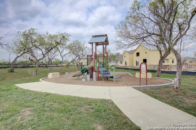 view of playground featuring a yard