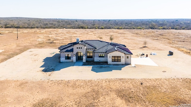 view of front of house featuring a rural view