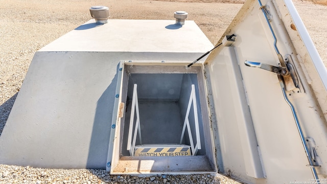 view of entry to storm shelter