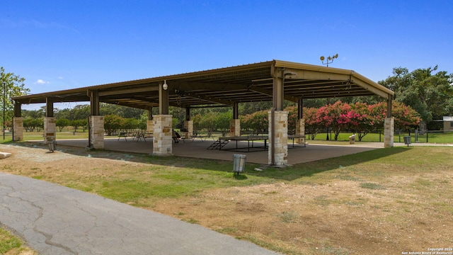 view of property's community with a yard