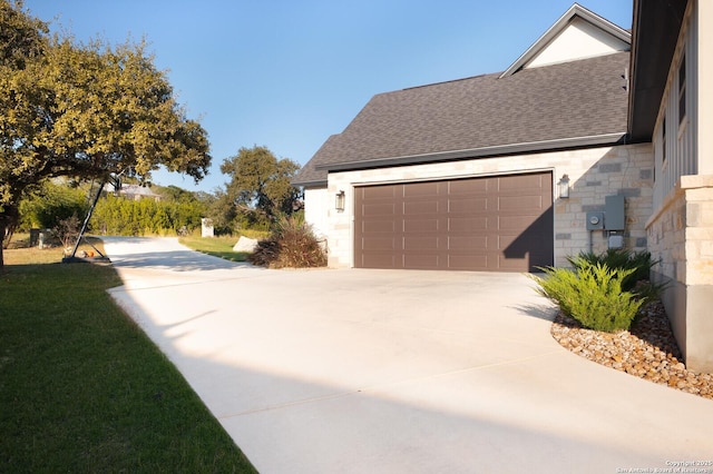 view of side of property featuring a garage