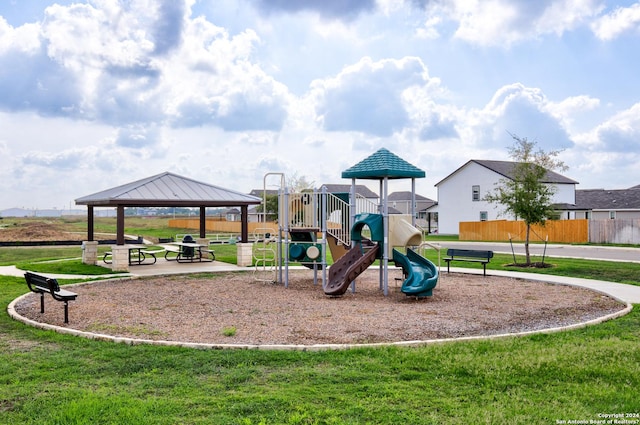 view of play area featuring a gazebo and a lawn