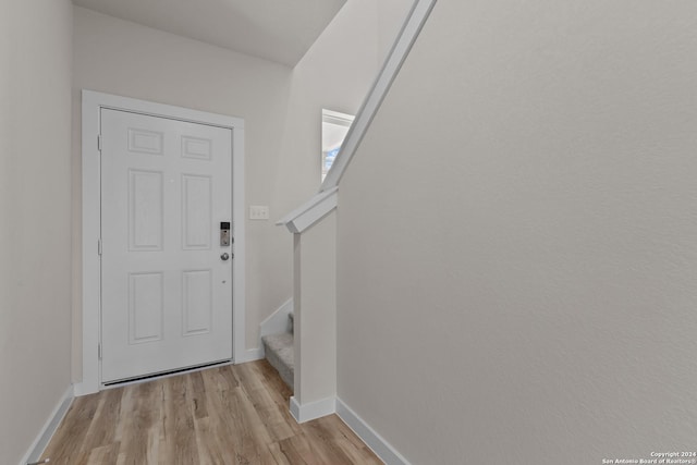 doorway to outside featuring light hardwood / wood-style floors