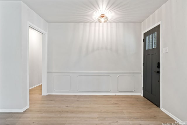 entrance foyer with light hardwood / wood-style floors