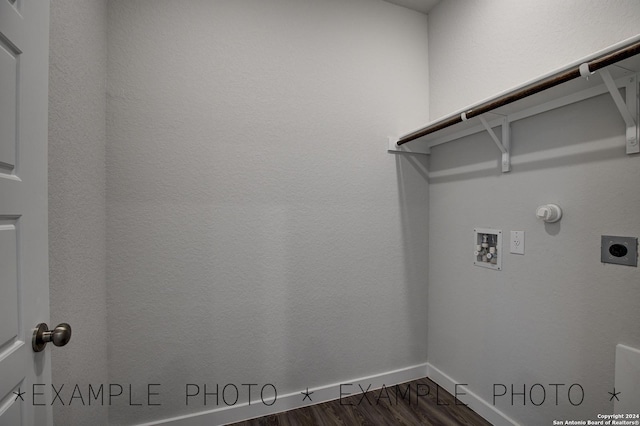 laundry area with gas dryer hookup, hookup for a washing machine, dark hardwood / wood-style floors, and electric dryer hookup