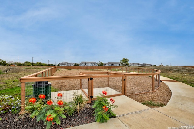 view of yard featuring central AC