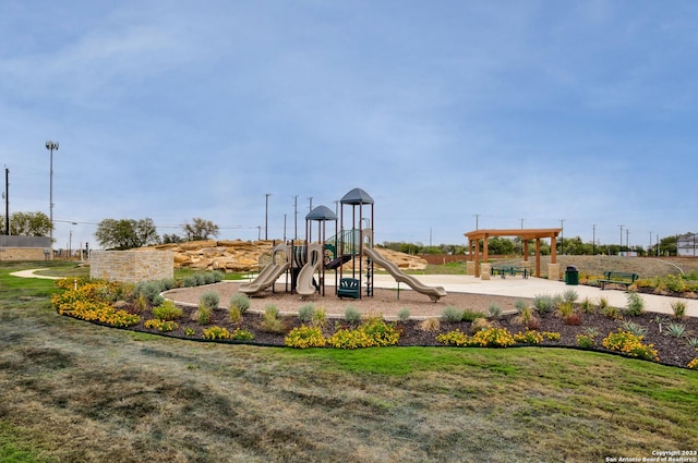 view of play area featuring a yard