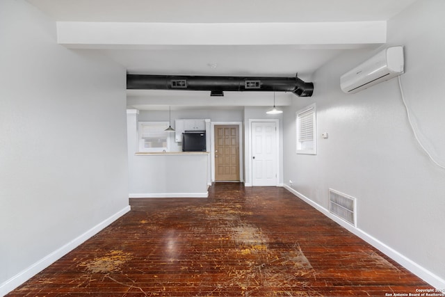 hallway with a wall mounted AC