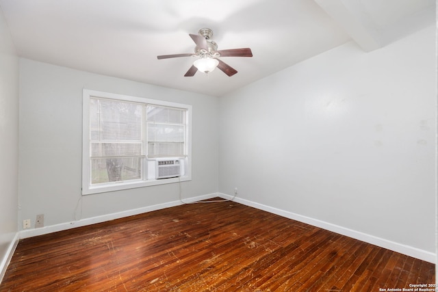 spare room featuring cooling unit, dark hardwood / wood-style floors, ceiling fan, and beam ceiling