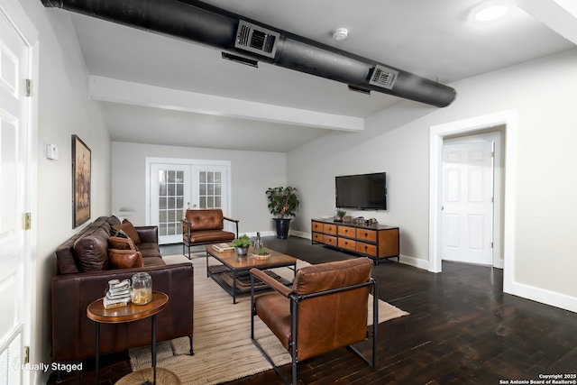 living room featuring dark hardwood / wood-style floors, beamed ceiling, and french doors