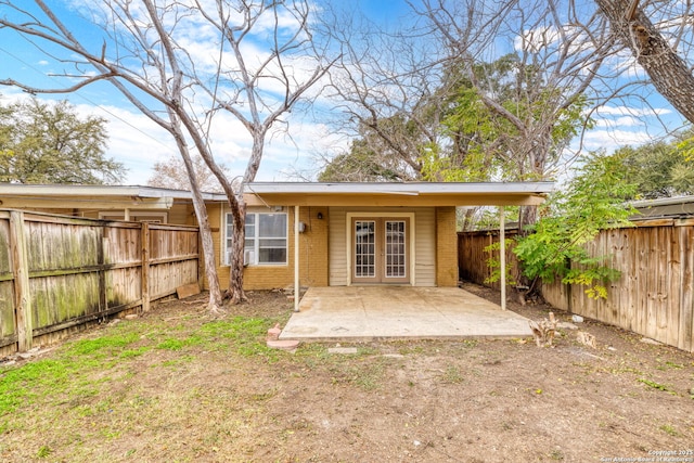 rear view of house featuring a patio area