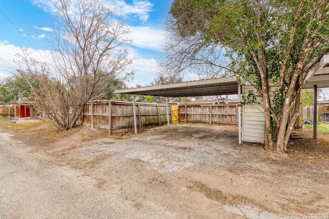 view of yard with a carport