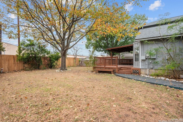 view of yard featuring a deck